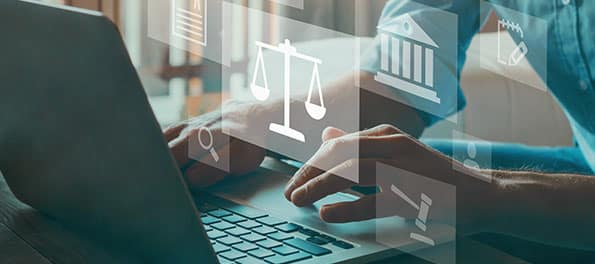 Dicas para advogados iniciantes Como ilustração deste parágrafo da matéria 9 dicas para advogados iniciantes, vemos a fotografia de um advogado digitando em seu laptop, ao redor vemos desenhos digitais de ícones da área do Direito.