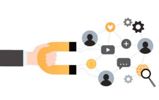 Como capa da matéria “Dicas para captar clientes na advocacia”, vemos um desenho representando atração de clientes, com uma mão segurando um imã conectado a símbolos digitais e pessoas
