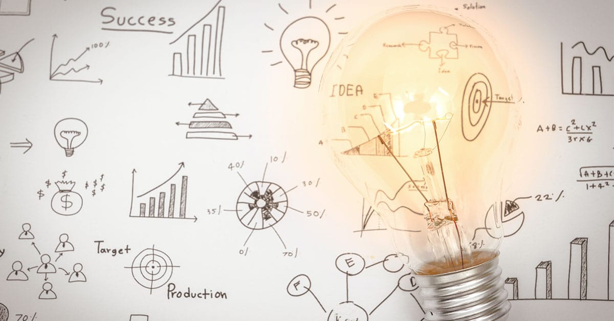 Como capa da matéria “Empreendedorismo na Advocacia: Novos caminhos para advogados”, vemos uma luz acesa com desenhos de gráficos ao fundo.