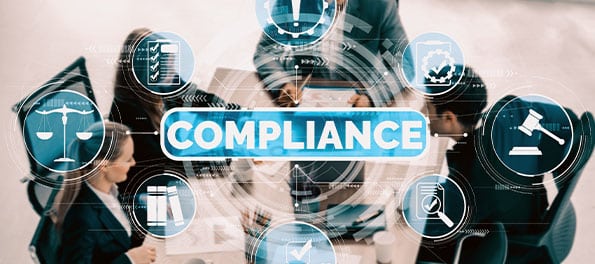 Uma mesa com advogados e ícones flutuantes representando o conceito de compliance.